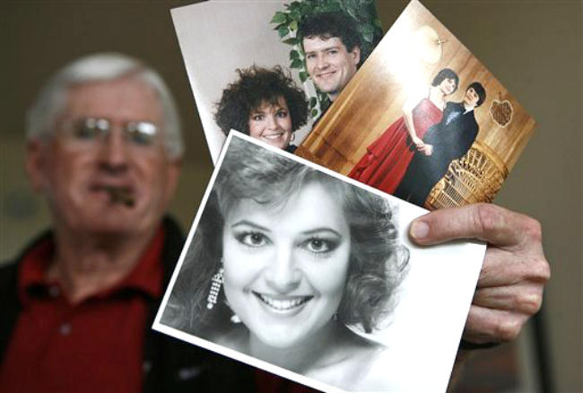 Jim Palin (father of Todd) displays pictures of his son and daughter in law