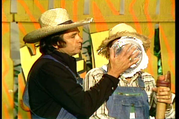 Johnny Cash smashes Archie Campbell in the face with a cream pie