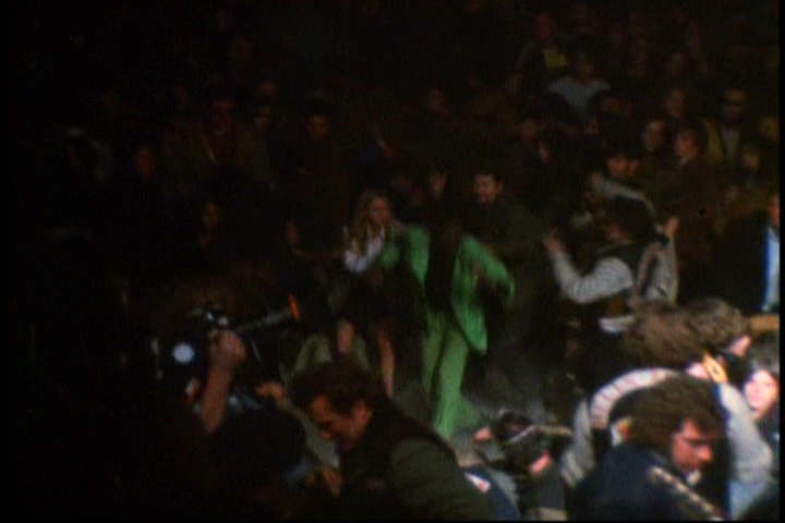 Meredith Hunter in the green suit has seconds left to live