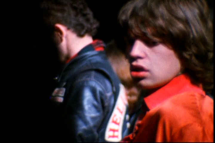 Mick Jagger watches Hell's Angel Alan Passaro kill Meredith Hunter at Altamont