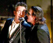 Bono and Bruce Springsteen on the mic