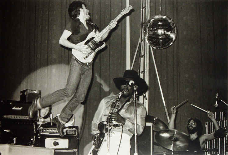 Bruce Springsteen flying through the air