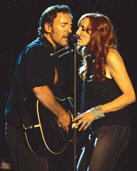 Bruce Springsteen and Patti Scialfa on the mic
