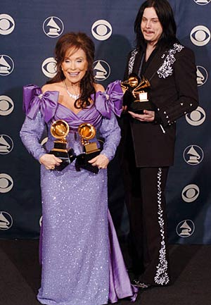 Loretta Lynn and Jack White lug an armload of Grammy awards