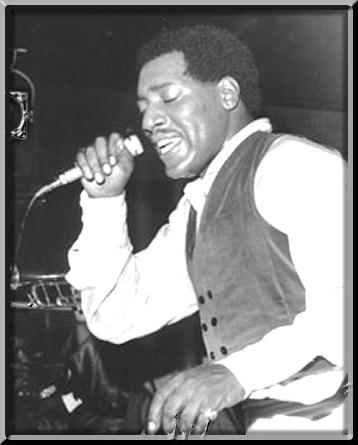 Black and white Otis Redding concert photo